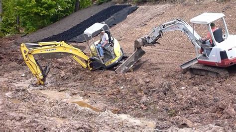 how to get mini excavator unstuck|trackhoe mini stuck in mud.